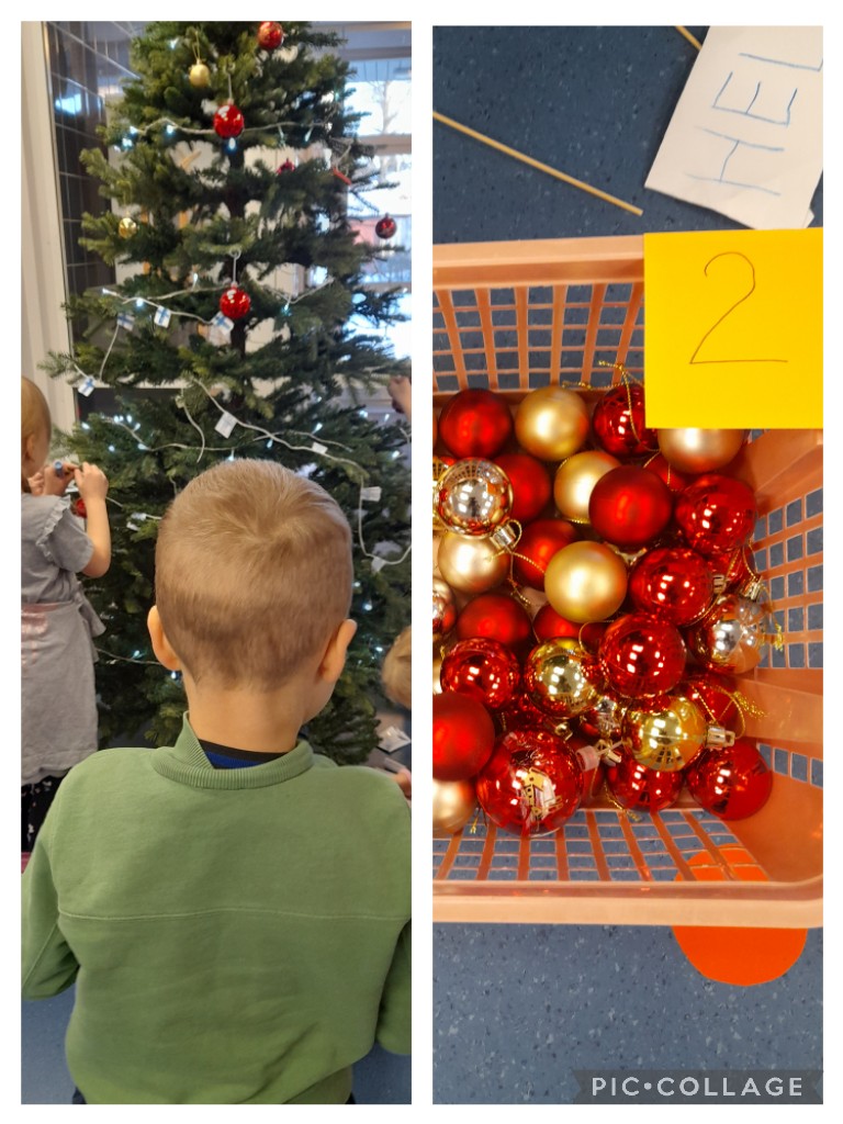 Lapset koristelevat joulukuusta palloilla, joita on muovikoridds
