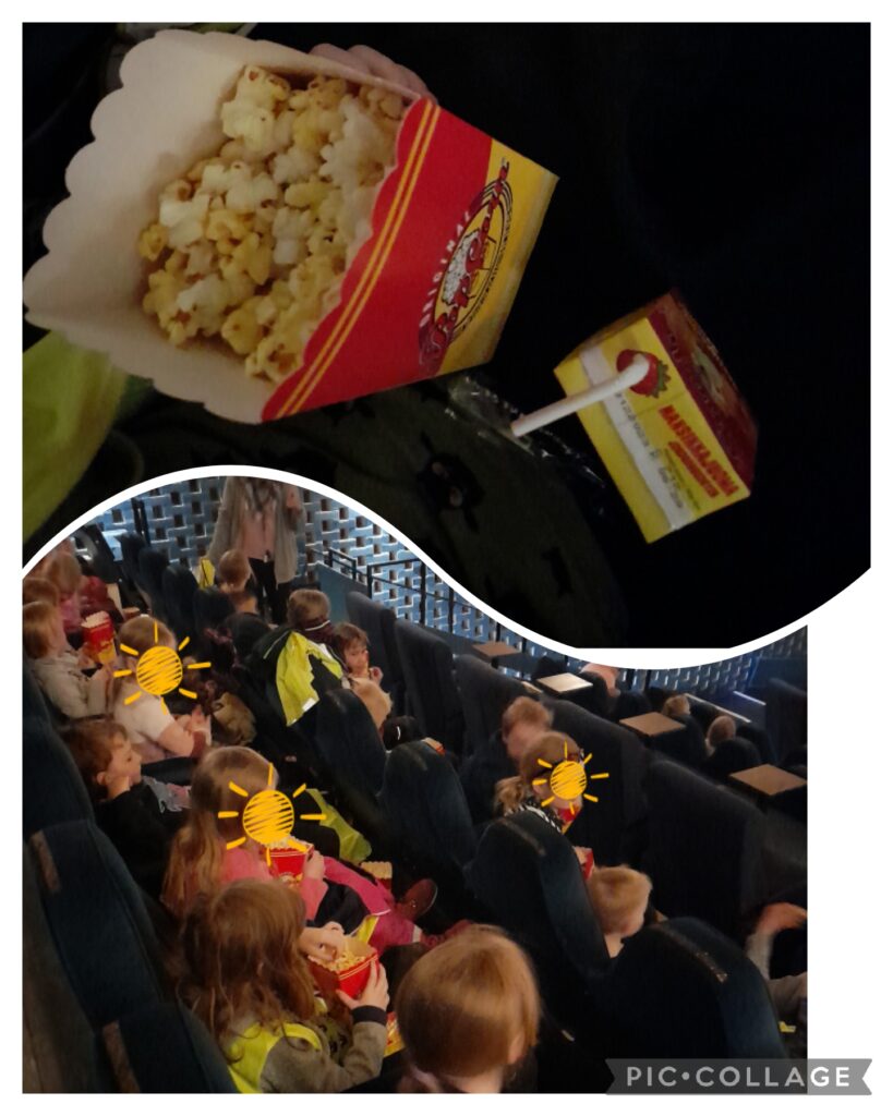 Lapset ovat elokuvateatterissa ja saaneet popcornia ja pillimehua