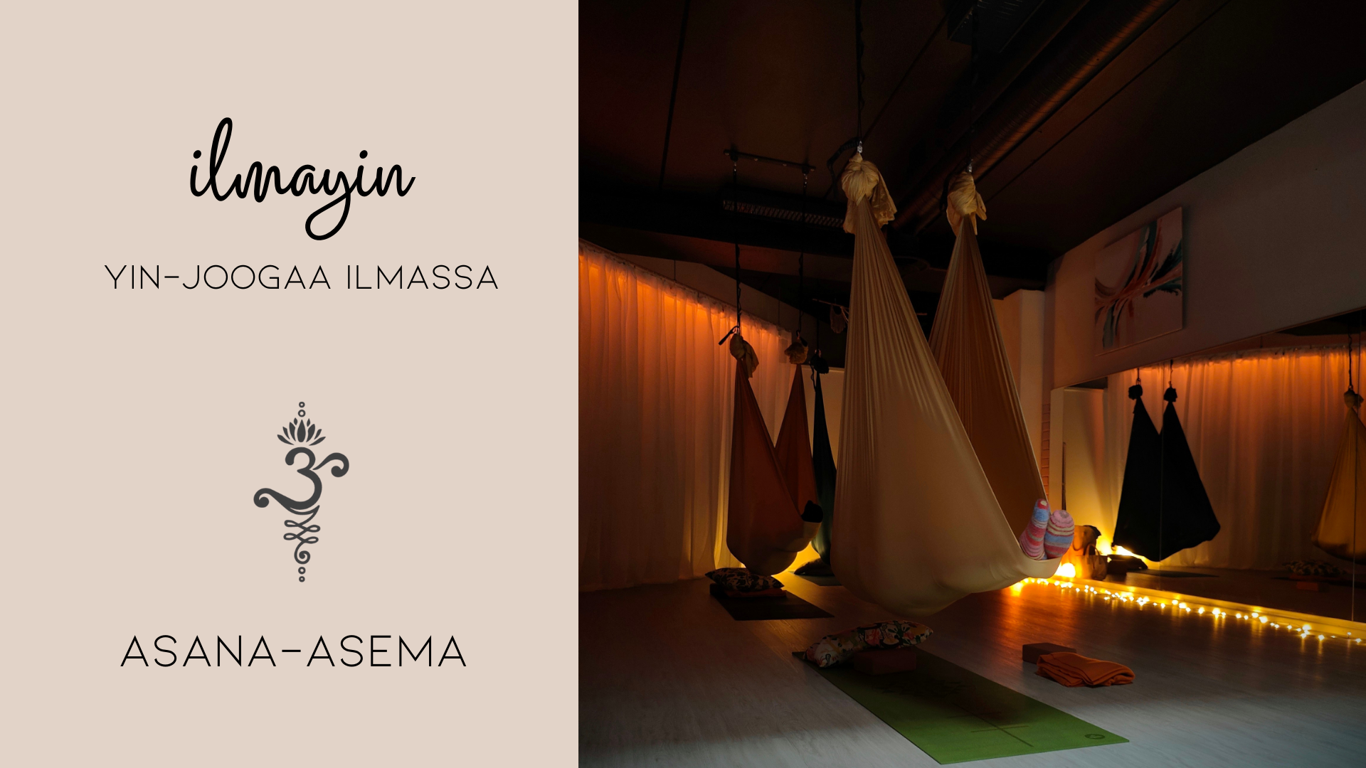 Kuvassa henkilöitä ilmajoogaliinojen sisällä Asana-aseman joogastudiolla.