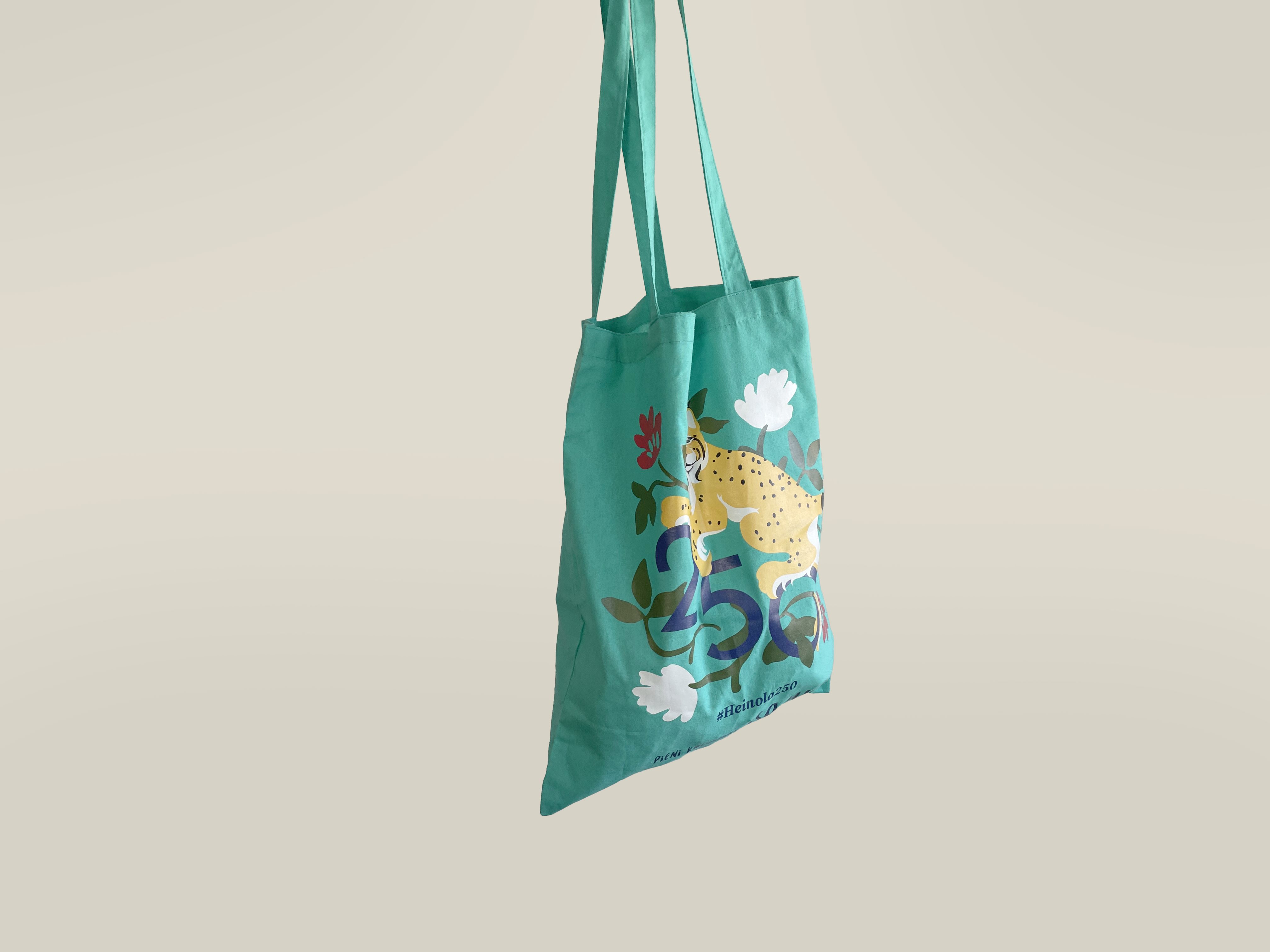 Osta Heinolasta kassin 250-vuotisjuhla ilme.